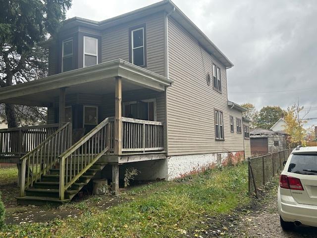10230 S Union Ave, Chicago, IL 60628 - view of side of property featuring a porch
