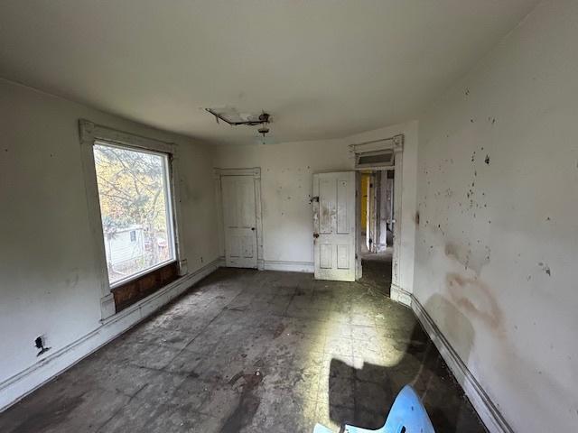 10230 S Union Ave, Chicago, IL 60628 - unfurnished bedroom with baseboards