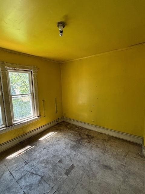 10230 S Union Ave, Chicago, IL 60628 - empty room featuring baseboards