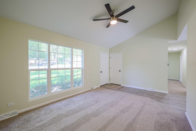 413 Channel Dr, Island Lake, IL 60042 - carpeted empty room with ceiling fan and high vaulted ceiling