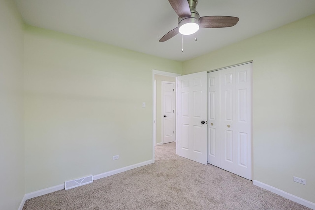 413 Channel Dr, Island Lake, IL 60042 - unfurnished bedroom featuring carpet flooring, a closet, and a ceiling fan