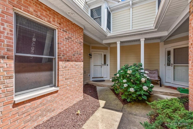 9196 Falcon Greens Dr, Lakewood, IL 60014 - view of exterior entry featuring brick siding