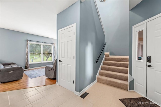 9196 Falcon Greens Dr, Lakewood, IL 60014 - entrance foyer with stairway and light tile patterned flooring