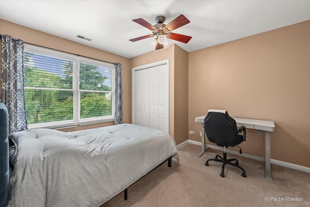 9196 Falcon Greens Dr, Lakewood, IL 60014 - carpeted bedroom with a closet and a ceiling fan