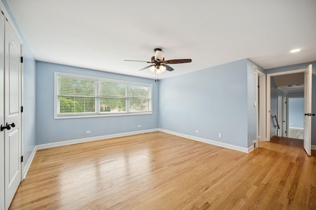 2425 N Drury Ln, Arlington Heights, IL 60004 - unfurnished bedroom featuring light wood-type flooring, ceiling fan, a closet, and recessed lighting