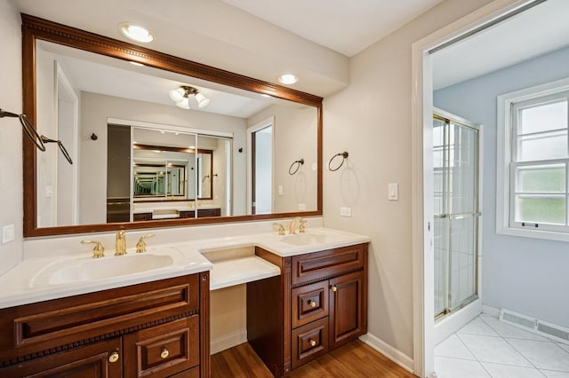 2425 N Drury Ln, Arlington Heights, IL 60004 - bathroom featuring double vanity and a stall shower