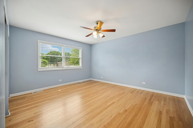 2425 N Drury Ln, Arlington Heights, IL 60004 - unfurnished room featuring ceiling fan and light wood finished floors