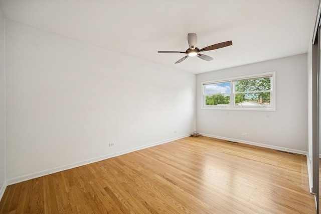 2425 N Drury Ln, Arlington Heights, IL 60004 - unfurnished room with light wood-type flooring and ceiling fan