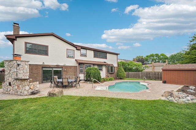 2425 N Drury Ln, Arlington Heights, IL 60004 - back of house with a chimney, a patio, and brick siding