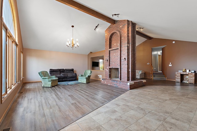 8542 Monaghan Dr, Tinley Park, IL 60487 - living area featuring a chandelier, a fireplace, and healthy amount of natural light