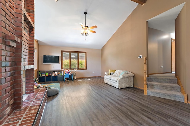 8542 Monaghan Dr, Tinley Park, IL 60487 - living room featuring wood finished floors, ceiling fan, high vaulted ceiling, and stairs
