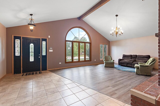 8542 Monaghan Dr, Tinley Park, IL 60487 - entryway featuring a chandelier, light tile patterned floors, high vaulted ceiling, and beam ceiling