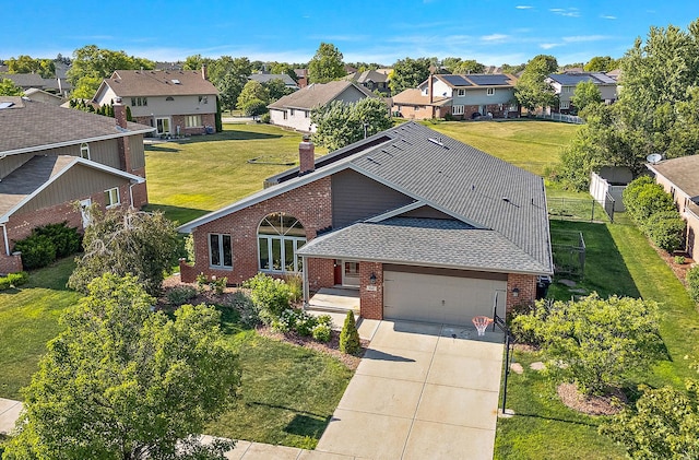 8542 Monaghan Dr, Tinley Park, IL 60487 - view of front facade featuring a residential view, brick siding, driveway, a chimney, and a garage