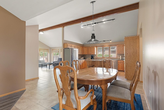 8542 Monaghan Dr, Tinley Park, IL 60487 - dining area with light tile patterned floors, beam ceiling, track lighting, and high vaulted ceiling