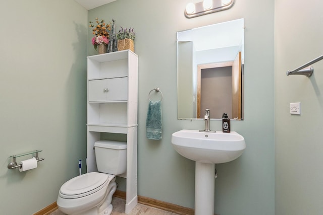 8542 Monaghan Dr, Tinley Park, IL 60487 - half bathroom with toilet and baseboards
