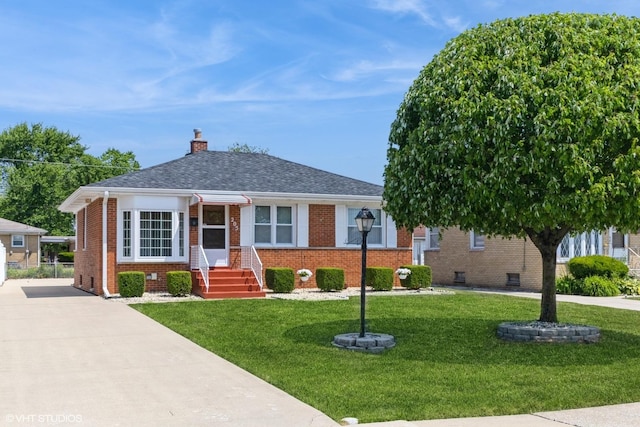 205 W 29th Pl S, Chicago Heights, IL 60411 - bungalow-style home with brick siding, a front yard, a chimney, and roof with shingles