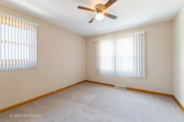 205 W 29th Pl S, Chicago Heights, IL 60411 - carpeted empty room featuring baseboards and ceiling fan
