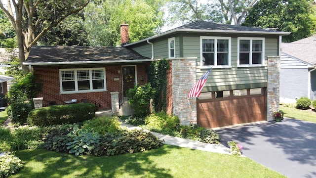 228 S Glendale Ave, Barrington, IL 60010 - view of front of house featuring a chimney, driveway, a garage, and brick siding