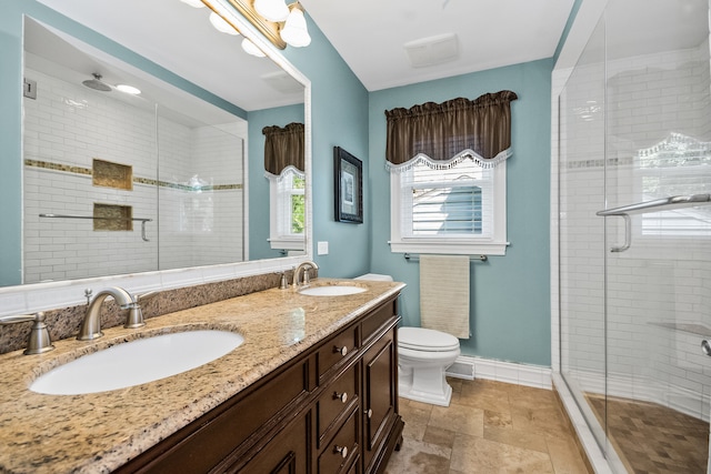228 S Glendale Ave, Barrington, IL 60010 - full bath featuring a stall shower, double vanity, and stone finish floors