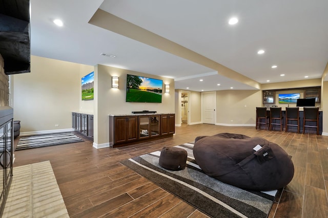 18013 Saint Andrews Dr, Marengo, IL 60152 - living room featuring dark wood-style flooring, recessed lighting, and bar
