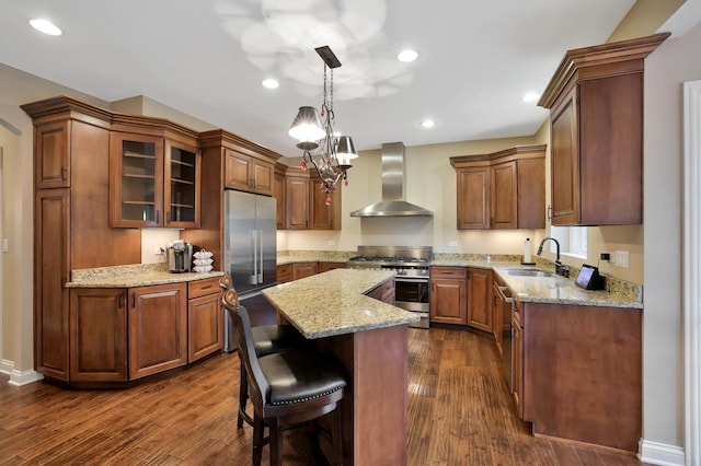 18013 Saint Andrews Dr, Marengo, IL 60152 - kitchen with wall chimney range hood, high end appliances, dark wood-type flooring, a kitchen island, and recessed lighting