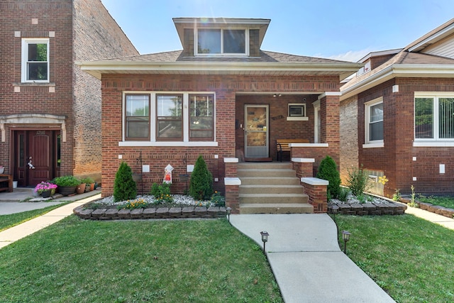 1314 Wesley Ave, Berwyn, IL 60402 - bungalow-style home featuring a porch, brick siding, and a front yard