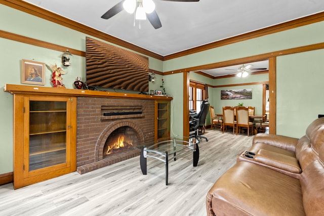 1314 Wesley Ave, Berwyn, IL 60402 - living room featuring a ceiling fan, crown molding, wood finished floors, and a brick fireplace