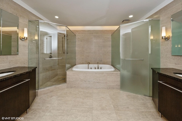 401 N Wabash Ave Unit 33Ab, Chicago, IL 60611 - bathroom with two vanities, a stall shower, a bath, and recessed lighting