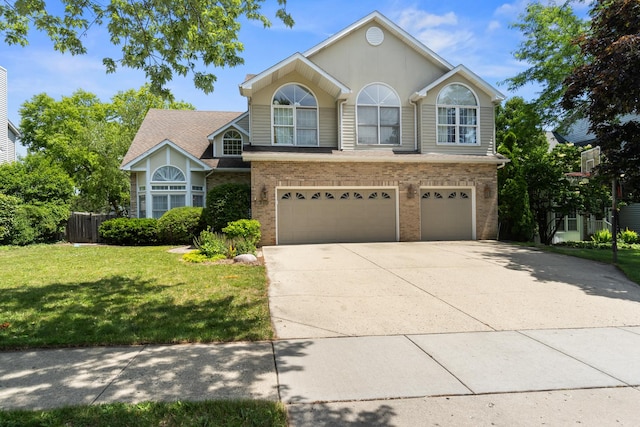 290 Knox Park Rd, Lake Zurich, IL 60047 - traditional-style home with brick siding, driveway, a garage, and a front lawn