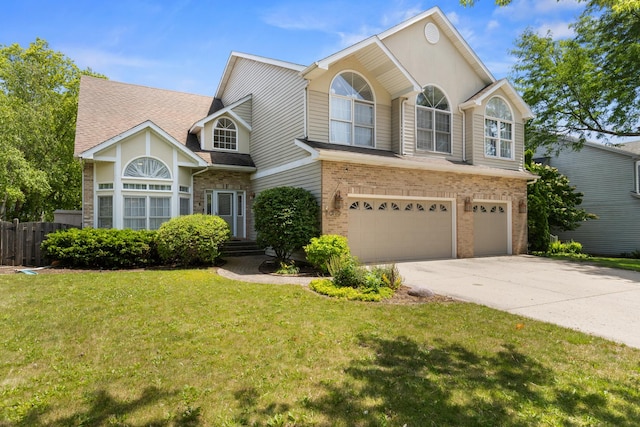 290 Knox Park Rd, Lake Zurich, IL 60047 - traditional home with an attached garage, brick siding, driveway, and a shingled roof