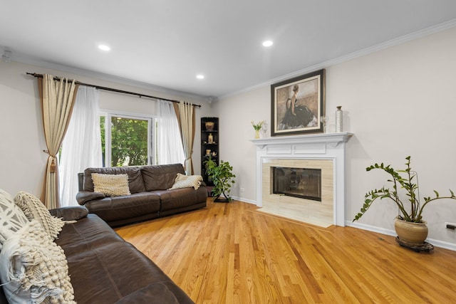 290 Knox Park Rd, Lake Zurich, IL 60047 - living room with ornamental molding, a tiled fireplace, wood finished floors, and recessed lighting