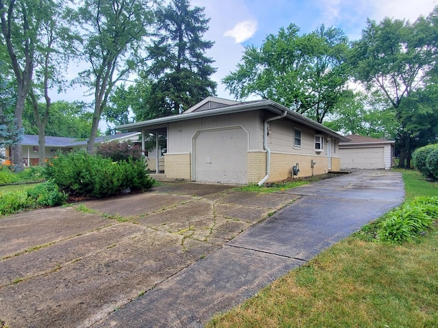 595 W Elk Grove Blvd, Elk Grove Village, IL 60007 - view of front of property featuring brick siding and an attached garage
