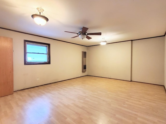 595 W Elk Grove Blvd, Elk Grove Village, IL 60007 - empty room featuring light wood-style floors, a ceiling fan, and ornamental molding