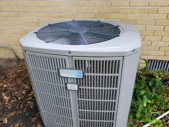 595 W Elk Grove Blvd, Elk Grove Village, IL 60007 - exterior view of a cooling unit and brick siding