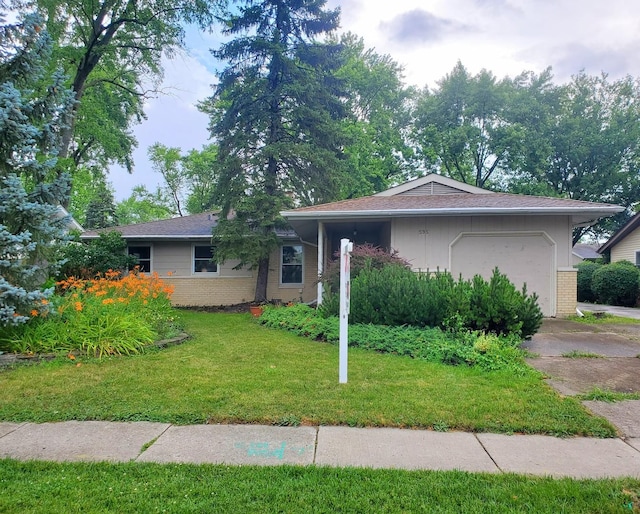 595 W Elk Grove Blvd, Elk Grove Village, IL 60007 - ranch-style home featuring brick siding, an attached garage, concrete driveway, and a front yard