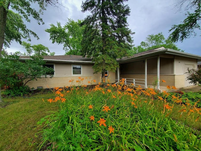 595 W Elk Grove Blvd, Elk Grove Village, IL 60007 - view of front facade with brick siding and a garage