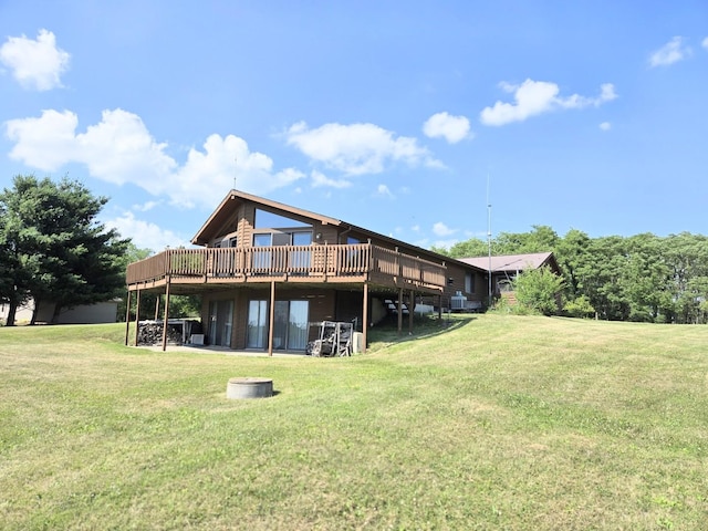 1928 Hidden Valley Dr, Lanark, IL 61046 - rear view of property featuring a deck and a lawn