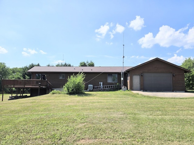 1928 Hidden Valley Dr, Lanark, IL 61046 - ranch-style home featuring a wooden deck, an attached garage, and a front yard