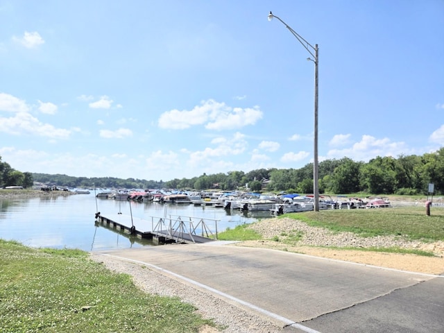 1928 Hidden Valley Dr, Lanark, IL 61046 - dock area featuring a water view and a boat ramp