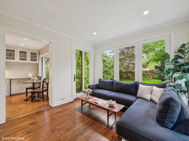 622 Kenilworth Ave, Kenilworth, IL 60043 - living room featuring recessed lighting, light wood-style floors, and crown molding