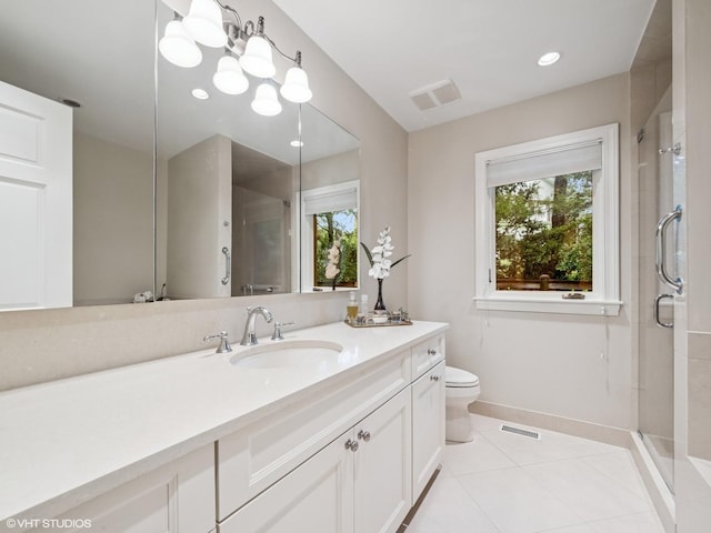 622 Kenilworth Ave, Kenilworth, IL 60043 - bathroom with a shower stall, vanity, and tile patterned flooring