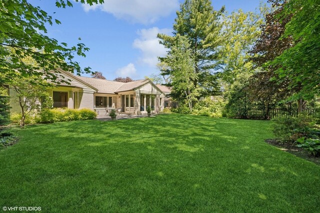 622 Kenilworth Ave, Kenilworth, IL 60043 - view of green lawn featuring a patio