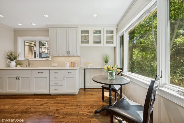 622 Kenilworth Ave, Kenilworth, IL 60043 - kitchen featuring crown molding, healthy amount of natural light, white cabinetry, and recessed lighting