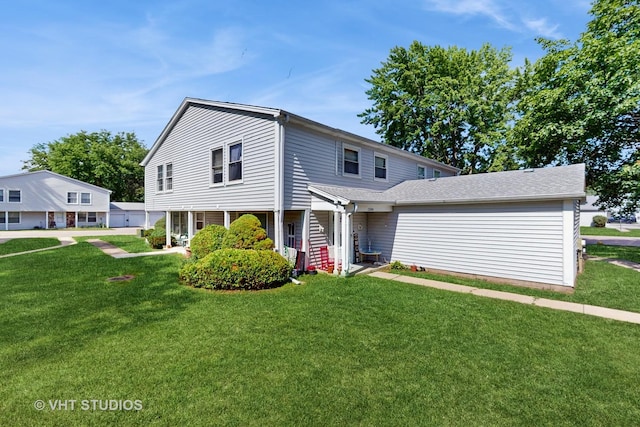 1320 N Glen Cir Unit B, Aurora, IL 60506 - view of front facade featuring a front yard