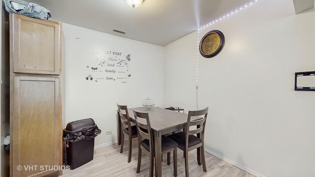 1320 N Glen Cir Unit B, Aurora, IL 60506 - dining area featuring light wood finished floors