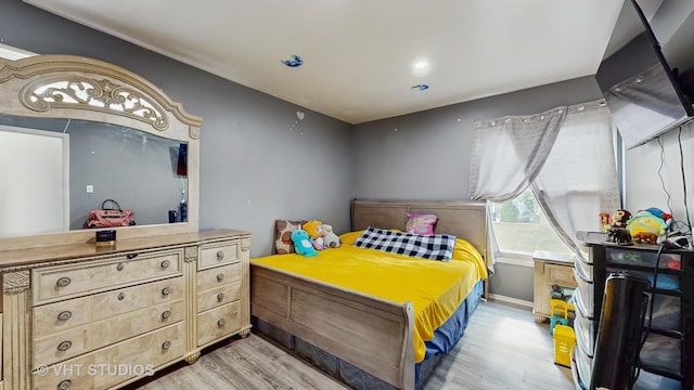 1320 N Glen Cir Unit B, Aurora, IL 60506 - bedroom featuring light wood-style flooring