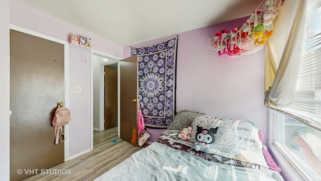 1320 N Glen Cir Unit B, Aurora, IL 60506 - bedroom with wood finished floors
