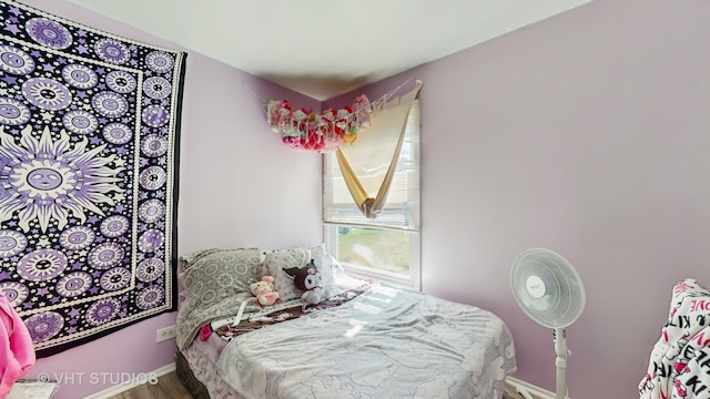 1320 N Glen Cir Unit B, Aurora, IL 60506 - bedroom with baseboards and wood finished floors