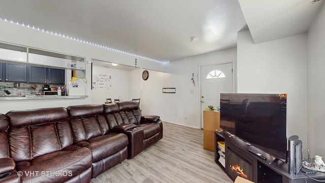 1320 N Glen Cir Unit B, Aurora, IL 60506 - living area featuring light wood-style floors and baseboards