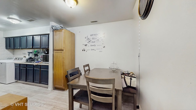 1320 N Glen Cir Unit B, Aurora, IL 60506 - dining area with washer / clothes dryer and light wood finished floors